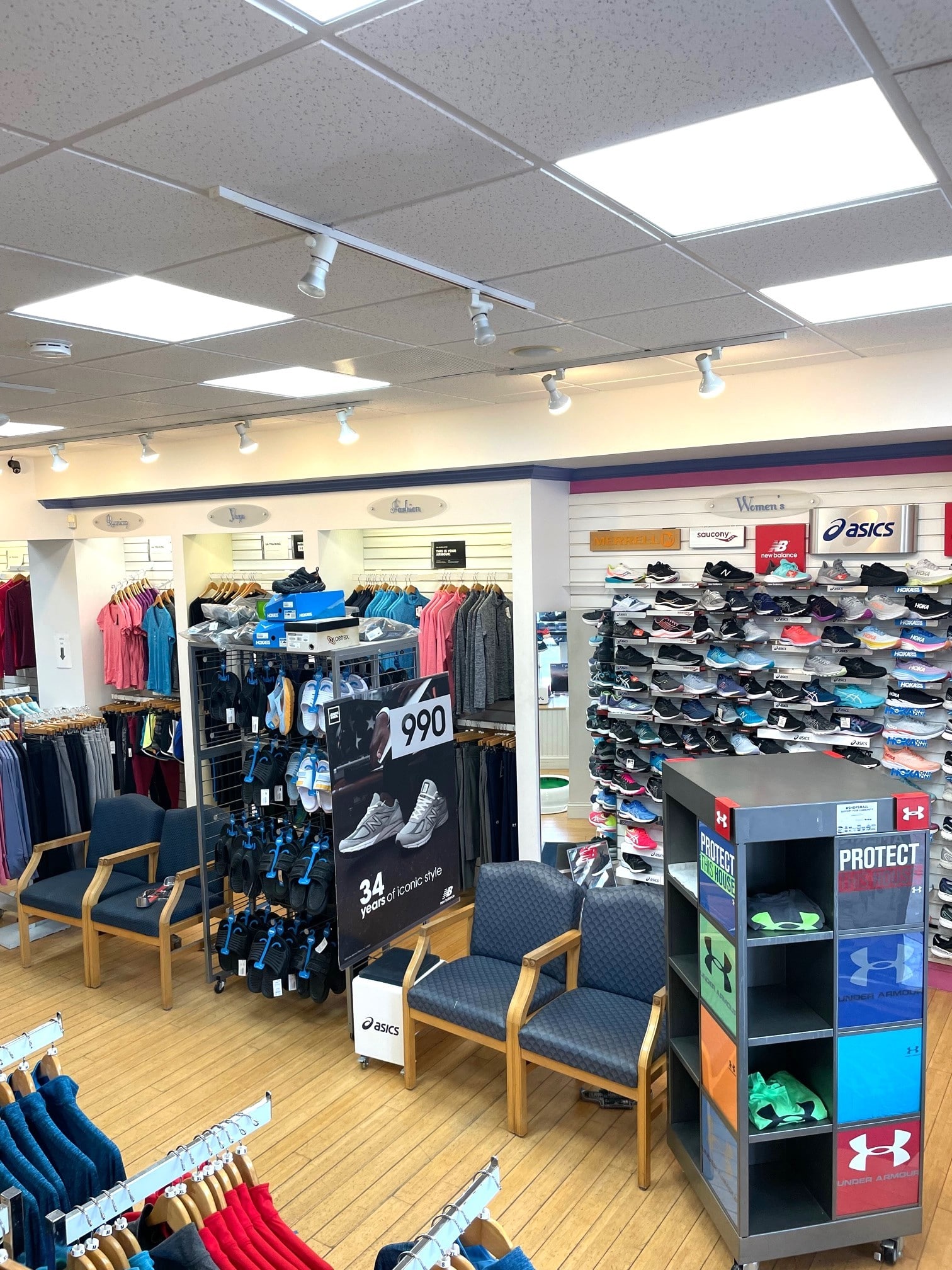 Store view of womens athletic clothing and sneakers